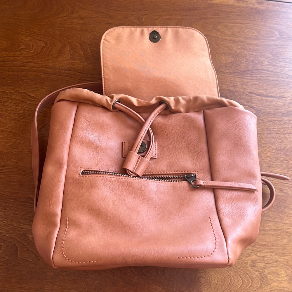 Tan universal thread mini backpack